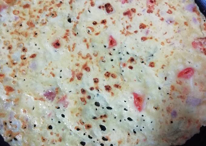 Onion tomato rava dosa