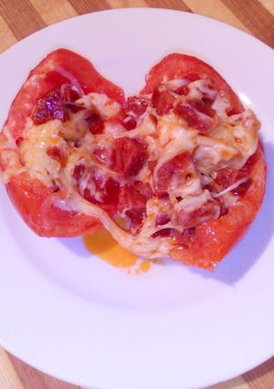 A picture of Stuffed Tomato With Chorizo & Cheese.