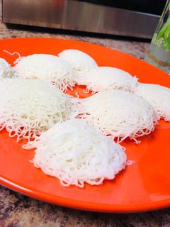 A picture of Kerala idiyappam recipe| nool puttu or sevai with rice flour.