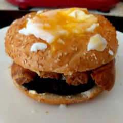 A picture of My Black Pudding, Sausage & Poached Egg Sesame Seeded Bagel 🥰.