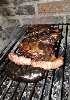 Una foto de 🇺🇾 Asado 🇺🇾 a las brasas 🇺🇾