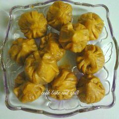 A picture of Steamed Jaggery Modaks.