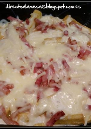 Una foto de Patatas Fritas estilo Foster´s Hollywood (Bacon Cheese Fries)