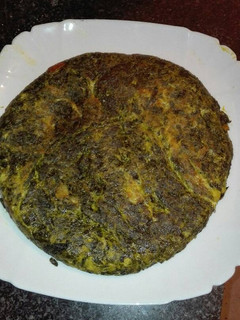 Una foto de Tortilla de espinacas y bacalao