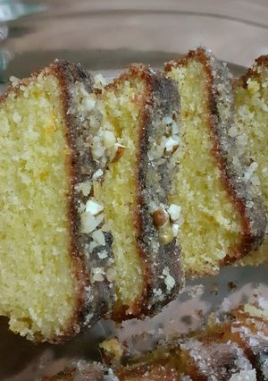 Una foto de Budín de naranja🍊 (hecho en molde de caja de leche)