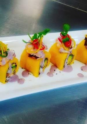 Una foto de Causa roll de pulpo
