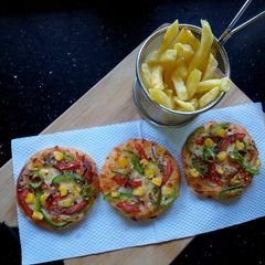 Mini pizza#recipemarathon#baking A picture of Mini pizza#recipemarathon#baking.
