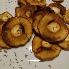 A picture of Parsnip crisps with sea salt and thyme.
