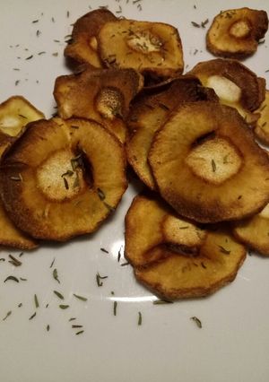 A picture of Parsnip crisps with sea salt and thyme.