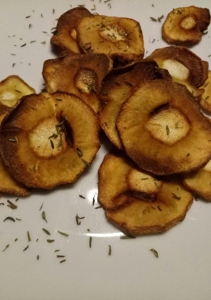 A picture of Parsnip crisps with sea salt and thyme.