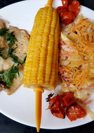 A picture of Oven Cooked Parmesan & Lemon Tilapia fish. 😁.