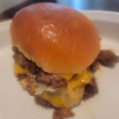 Smothered and Covered Smash Burgers on Hawaiian Buns A picture of Smothered and Covered Smash Burgers on Hawaiian Buns.