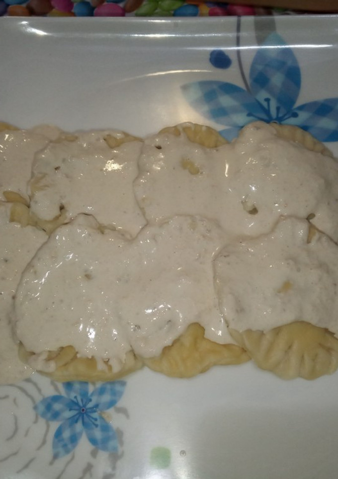 Una foto de Raviolis de pera con salsa de nueces