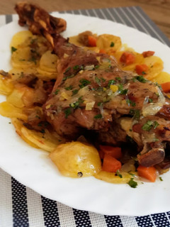 Una foto de Paletilla de cordero con salsa cítrica/especial Navidad