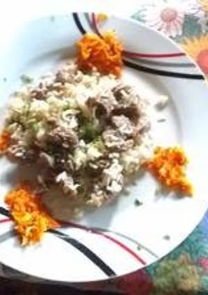 Una foto de Arroz con Mollejas de Pollo y Ensalada de Zanahoria