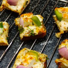 A picture of Open Cheesy Paneer Tikka Sandwich Bites !!.