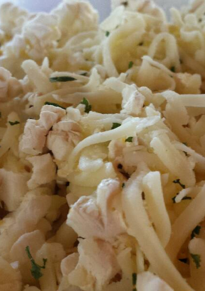 Una foto de Palomitas con mantequilla, mozzarella, ajo y perejil
