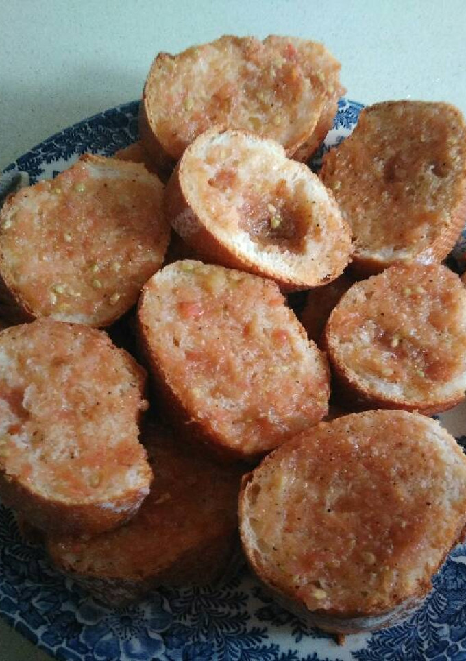 Una foto de Pan tomate al minuto