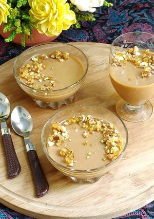 A picture of Salted Caramel Panna Cotta Topped with Praline.