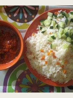 A picture of Rice and tomato stew.