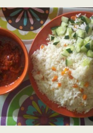 A picture of Rice and tomato stew.