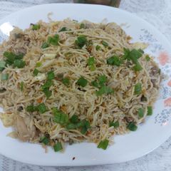 A picture of Fried Rice with noodles.