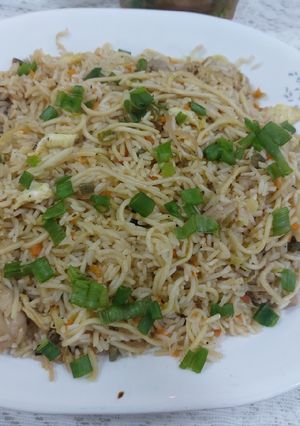 A picture of Fried Rice with noodles.