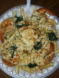 A picture of Chicken & shrimp Alfredo.