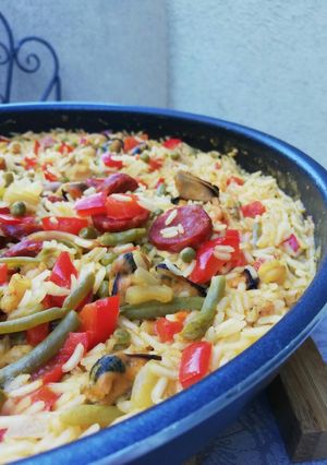 Una foto de Paella mar y montaña