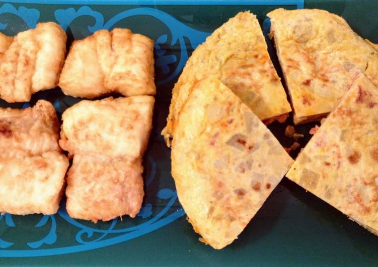 Merluza frita y tortilla de patatas con chorizo ibérico