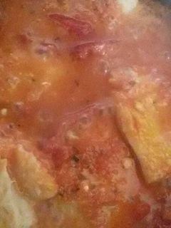 Una foto de Bacalao con tomate y pimientos