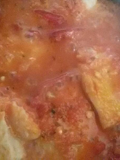 Una foto de Bacalao con tomate y pimientos