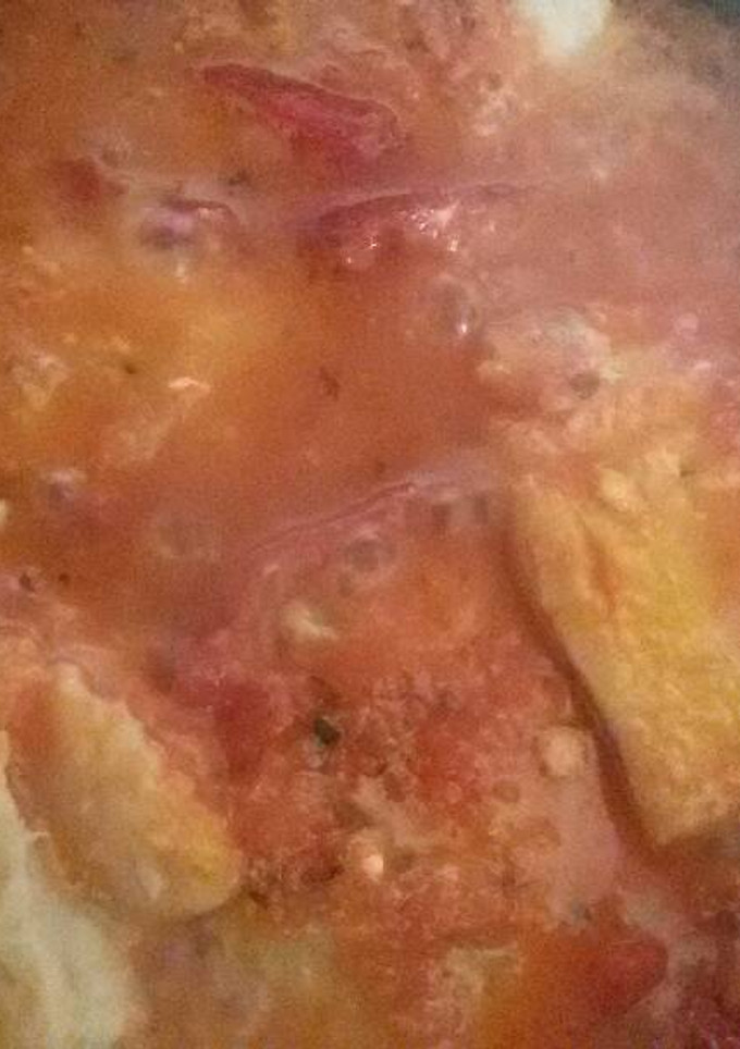 Una foto de Bacalao con tomate y pimientos