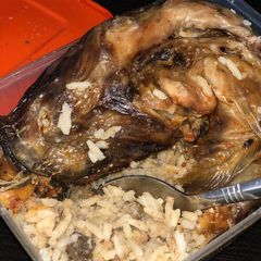 A picture of Coconut rice with dry fish.