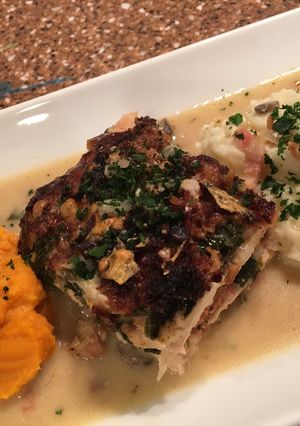 A picture of Chicken spinach mushroom and herb layer bake.