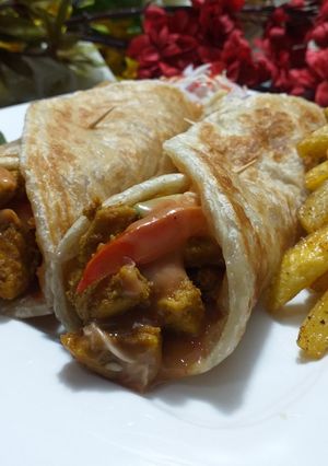 A picture of Chicken tikka paratha roll.