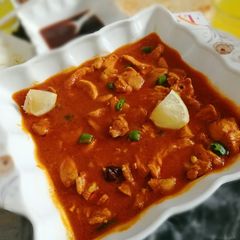 A picture of Imli chicken gravy.
