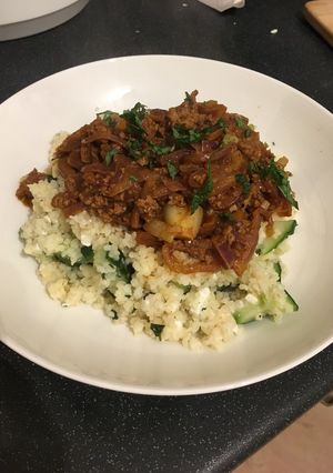 A picture of Lamb Ragu and Warm Feta Bulgur Salad.