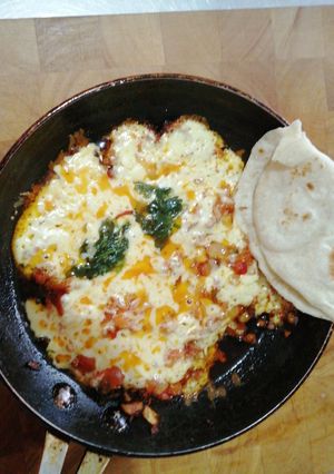 Una foto de Queso fundido con chorizo