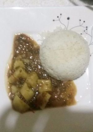 A picture of Rice and dengu stew(greengrams).