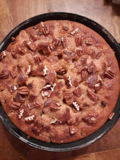 A picture of Cinnamon crumb cake with chocolate chips and pecans.
