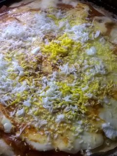 Una foto de Pizza con masa batida