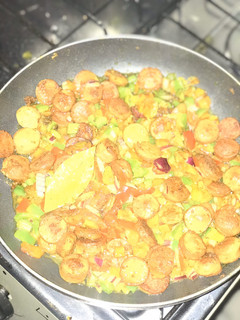 A picture of Stir fry veggies and sausage.