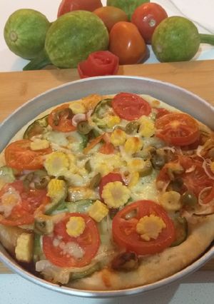 A picture of Veggie chicken pizza.