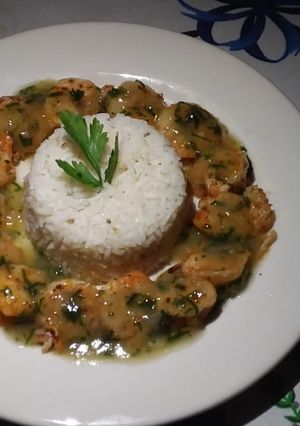 Una foto de Camarones flameados
