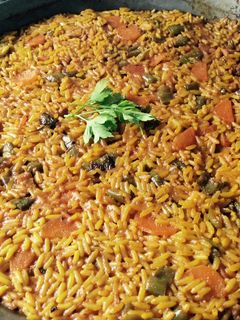 Una foto de Paella de secreto ibérico 🐖