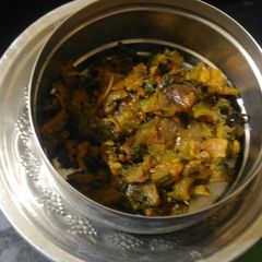 A picture of Pavakka Kaipakka mezhukkupuratti Bitter ground stir fry.