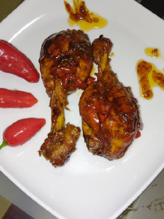 Una foto de Pollo caramelizado al ají topito de la casa