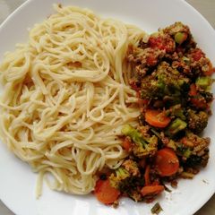 A picture of Broccoli stir fry and spaghetti.