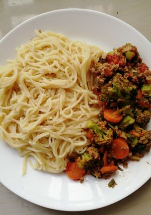 A picture of Broccoli stir fry and spaghetti.